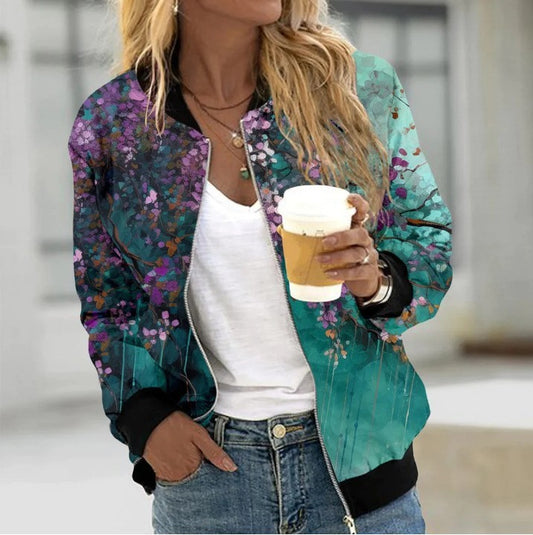 Person wearing a colorful floral jacket holding a coffee cup.