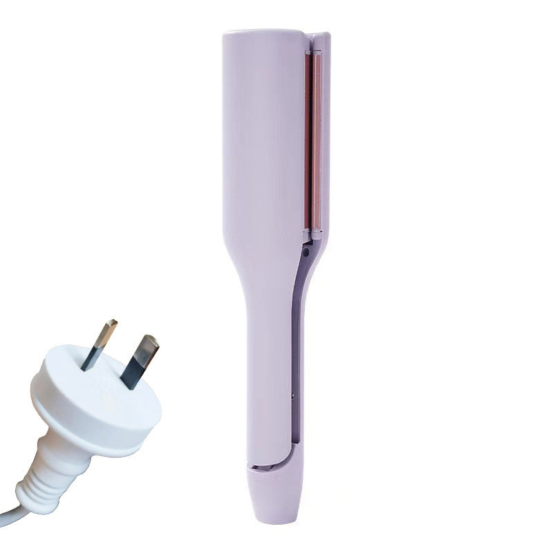 Hair straightener with plug on a white background