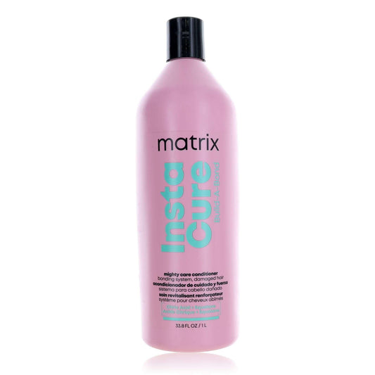 Matrix Instacure conditioner bottle, pink plastic with black cap