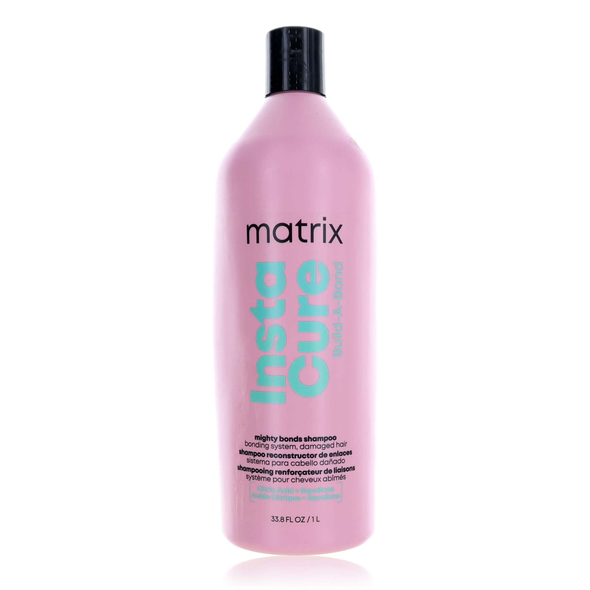 Matrix InstaCure shampoo bottle, pink with black cap