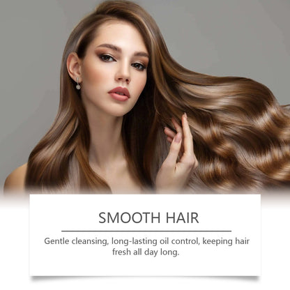 Woman with smooth, styled hair against a neutral background