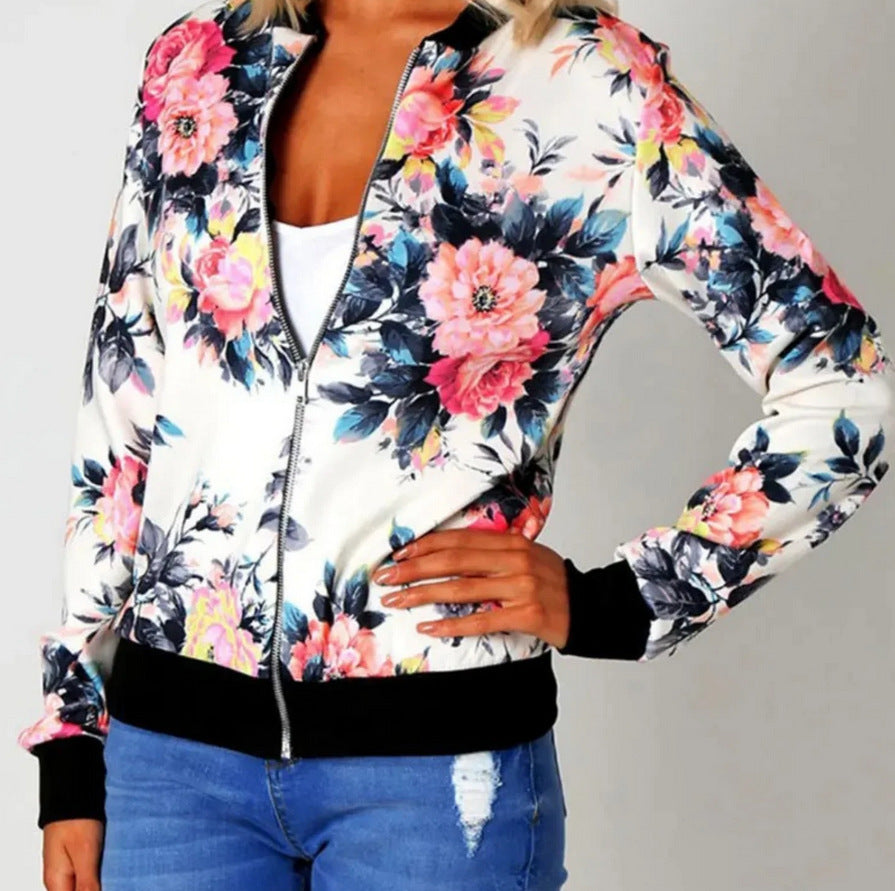 Floral patterned jacket worn by a person on a plain background