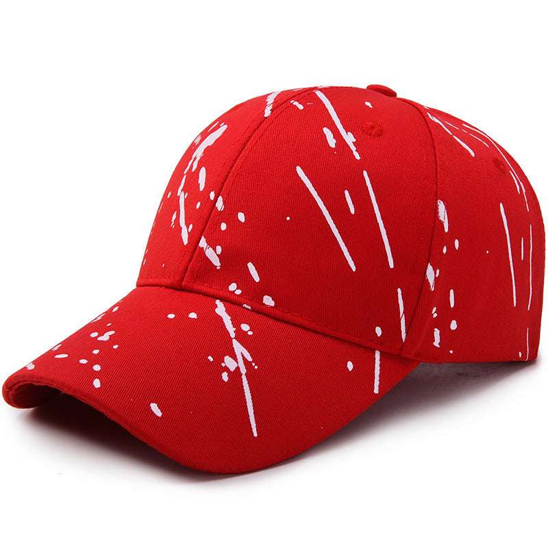 Red baseball cap with white graffiti drip print, curved brim, adjustable fit
