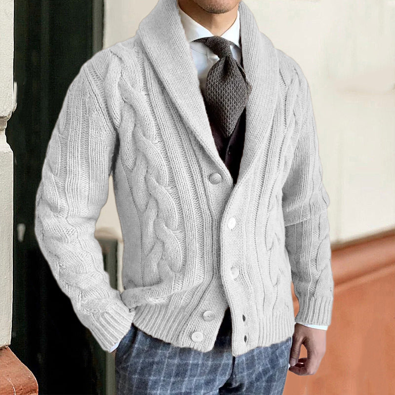 Light gray cable-knit cardigan with shawl collar, button front, and long sleeves