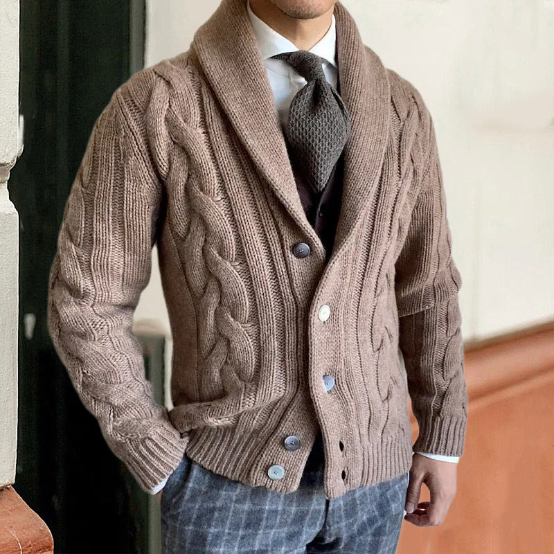 Tan cable-knit cardigan with shawl collar, button front, and long sleeves