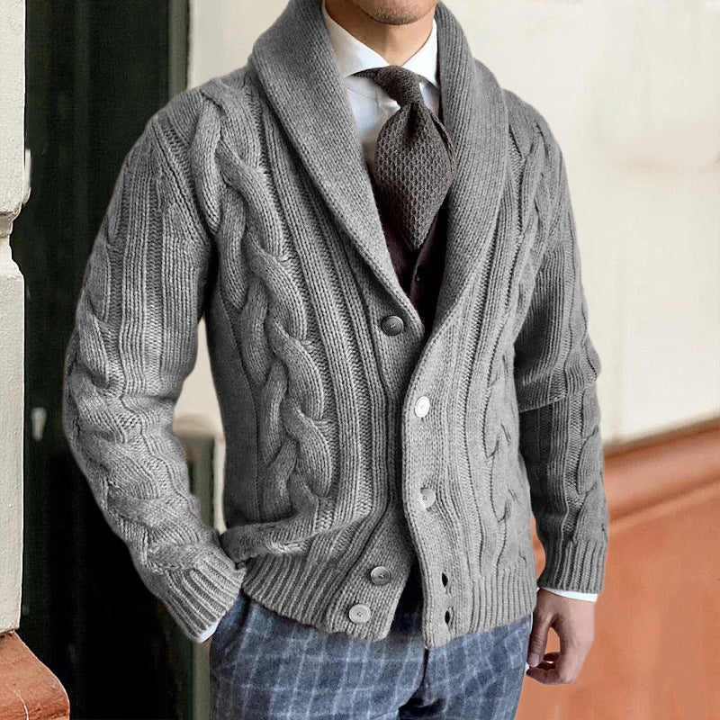 Gray cable-knit cardigan with shawl collar, button front, and long sleeves