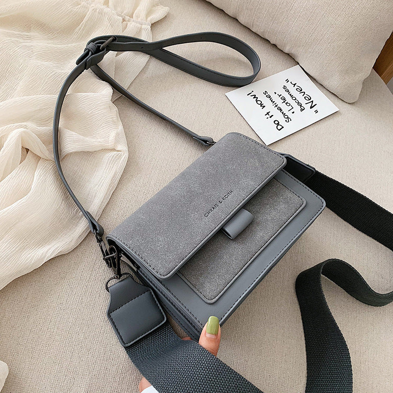 Small square crossbody bag with flap, grey leather-look front and adjustable shoulder strap