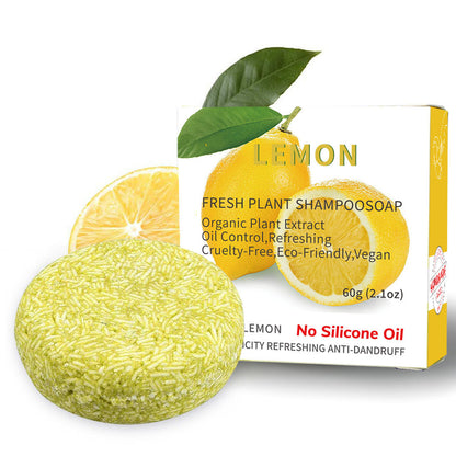 Lemon-scented shampoo bar with packaging on a white background