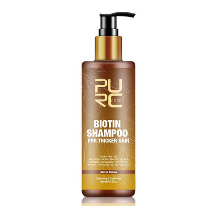 Biotin shampoo bottle with pump on a white background