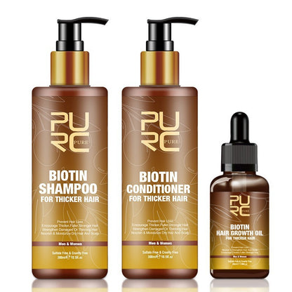 Three bottles of Pure Biotin hair care products on a white background