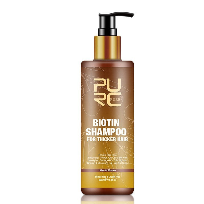 Biotin shampoo bottle with pump on a white background