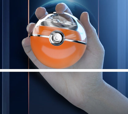 Hand holding a Poké Ball-like object against a blue background