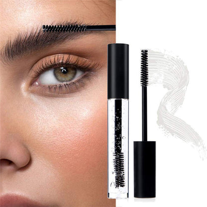 Mascara with applicator next to a close-up of an eye wearing mascara.