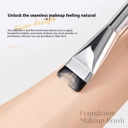 Foundation makeup brush with text on a light background