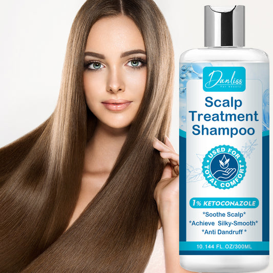 Woman with long hair holding a bottle of Danliss Scalp Treatment Shampoo.