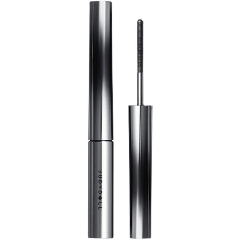 Silver eyeliner pen with cap on a white background