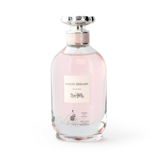 Women's Coach Dreams EDP spray bottle with pink glass and silver atomizer cap