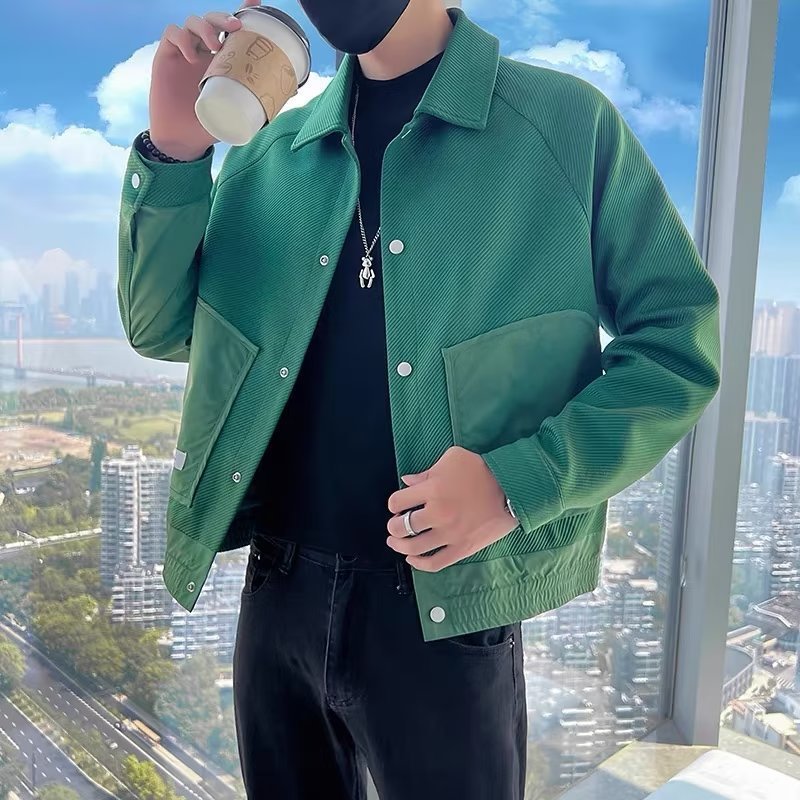 Green lapel jacket with button cuffs and chest patch pocket