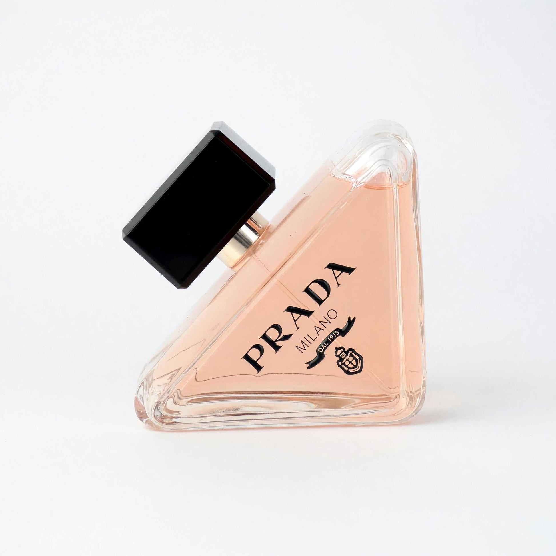 Women's Prada Paradoxe EDP tester: pink triangular bottle with black cap and logo