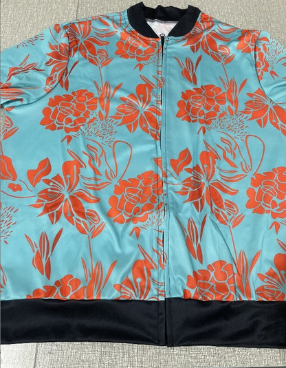 Floral patterned jacket with orange flowers on a turquoise background